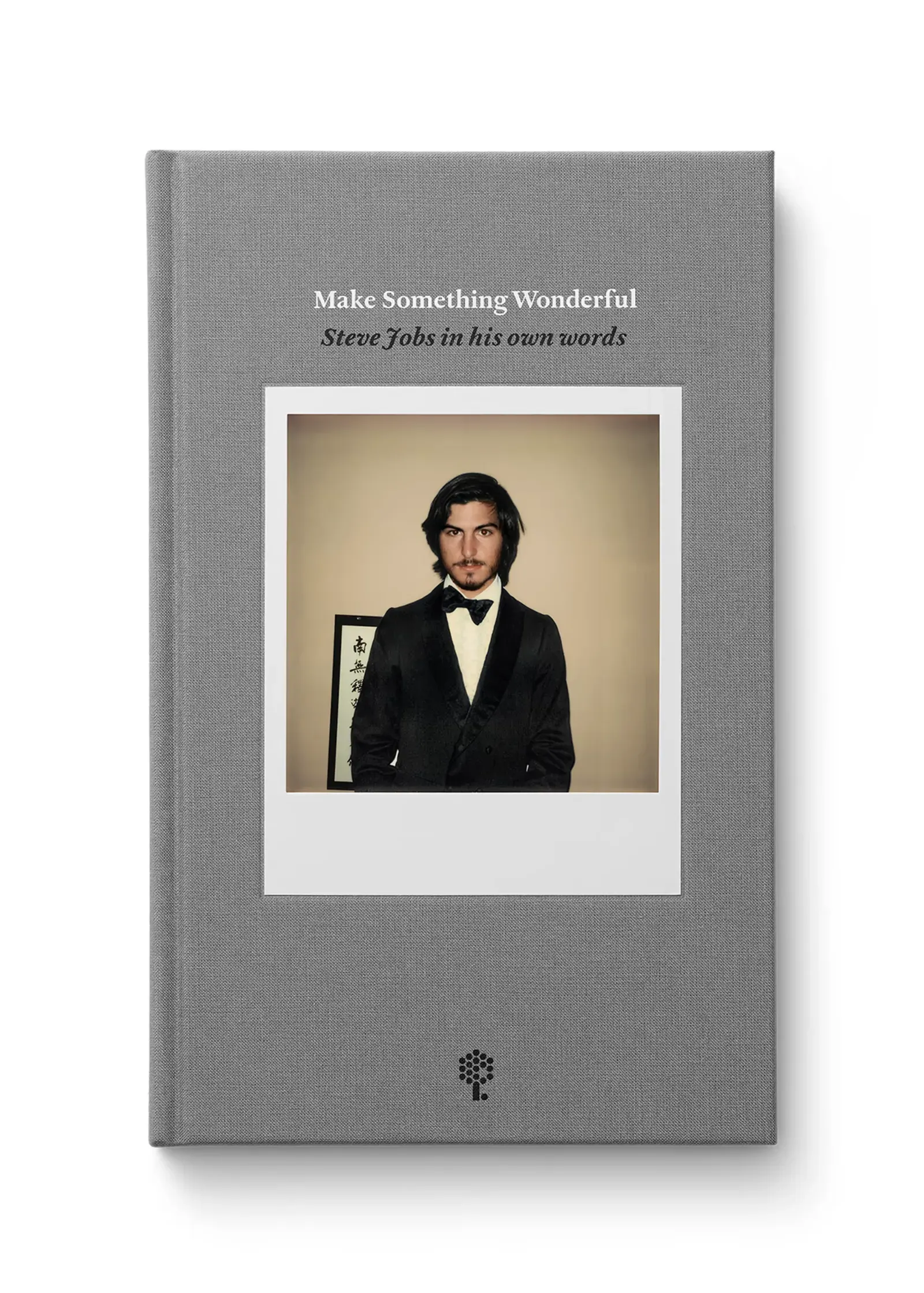 Grey cloth book cover reading Make Something Wonderful, Steve Jobs in his own words, with a Polaroid portrait