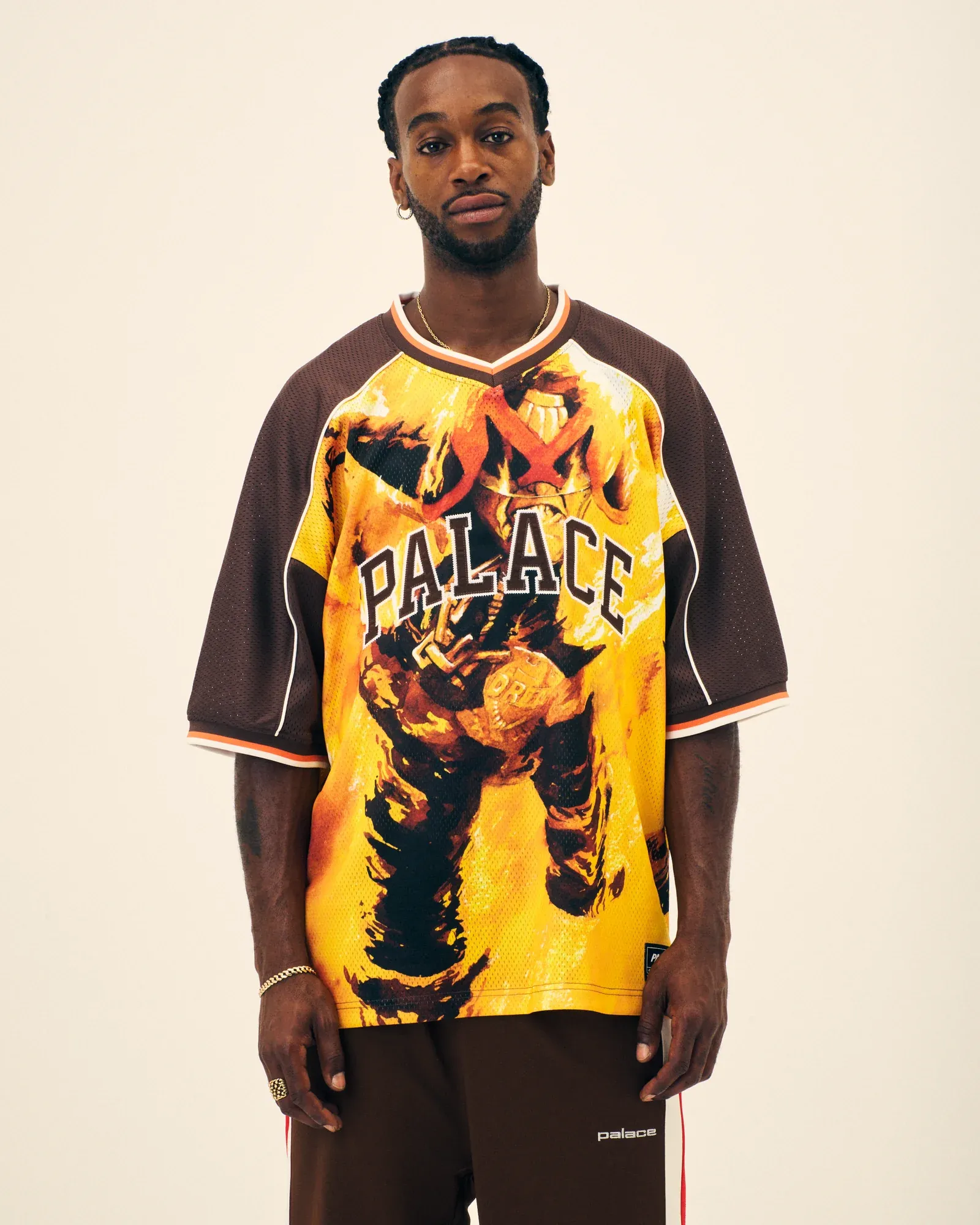 Model in Palace’s brown Judge Dredd mesh jersey with flames, from the Winter 2026 lookbook