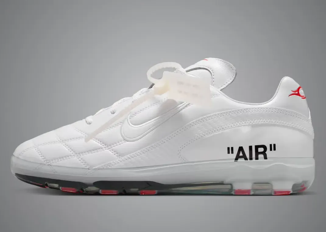 Nike Cryoshot in white quilted leather with AIR on the side, a plastic zip tag and red studs sealed in a clear sole