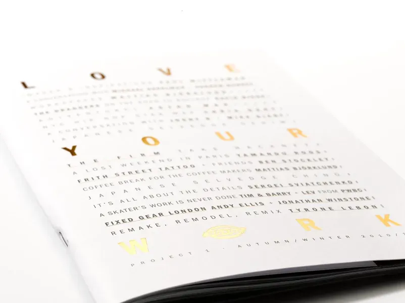 Cover of the Dickies Love Your Work bookzine in gold type, listing A Skater’s Work Is Never Done with Lev from PWBC