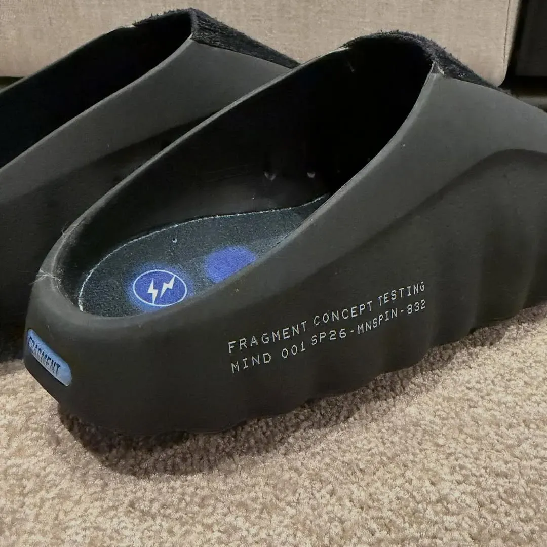Black Fragment Design version of the Mind 001, printed Fragment Concept Testing, a lightning-bolt logo on the insole