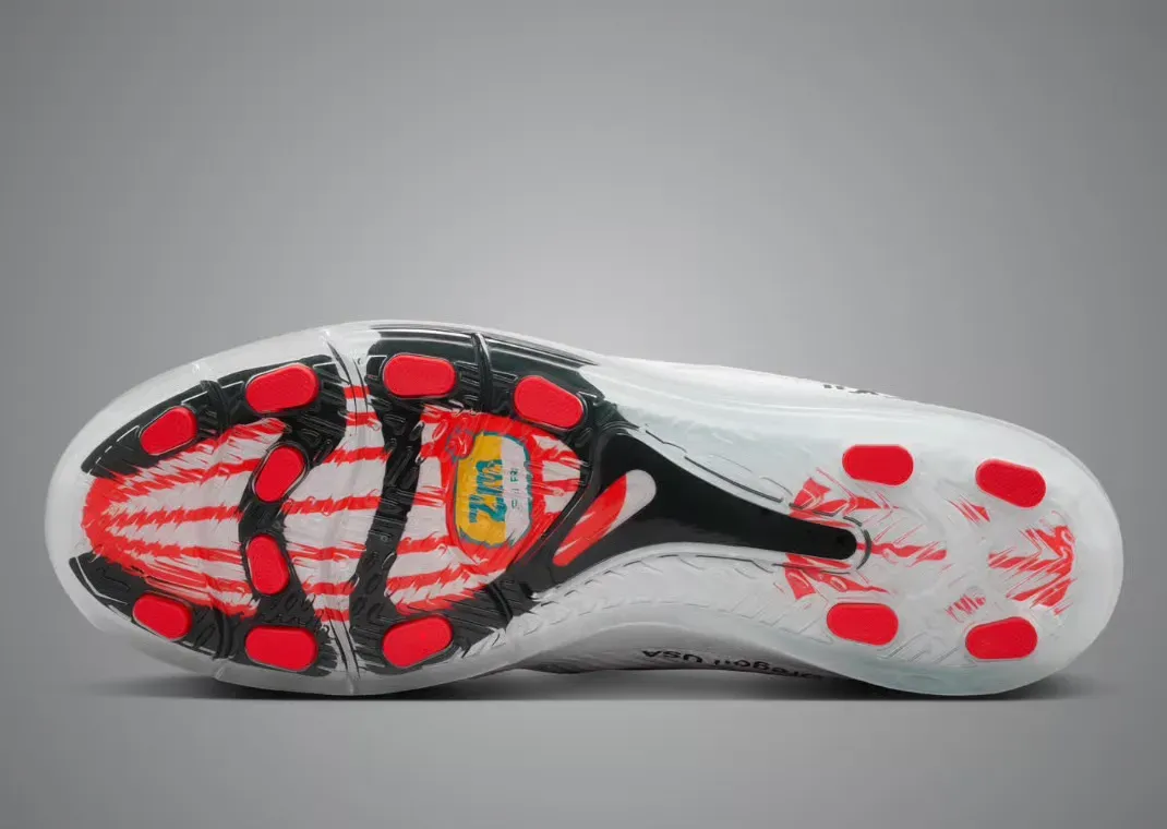 Underside of the Cryoshot: red studs and a red and white pattern showing through the clear sole
