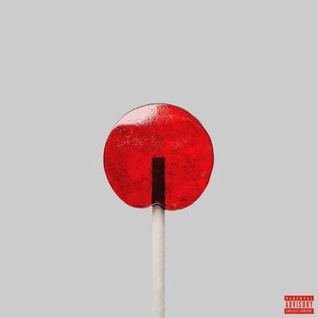K-Pop single cover: a glossy red lollipop on a white stick against grey, with a Parental Advisory label