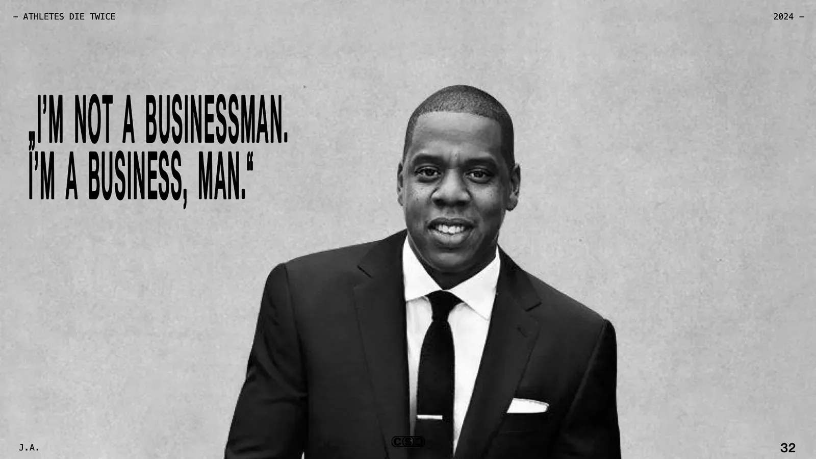 Black-and-white portrait of a smiling man in a suit and tie beside the line: I’m not a businessman, I’m a business, man